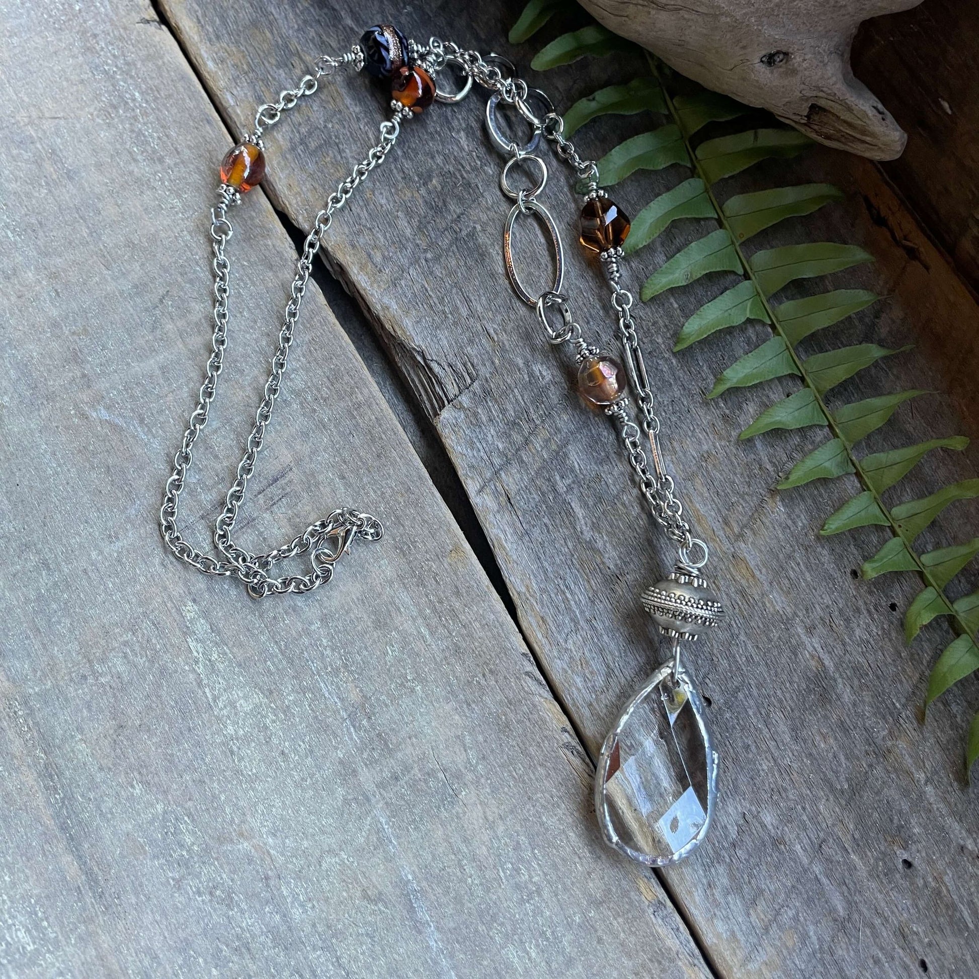 Necklace with glass beads and crystal