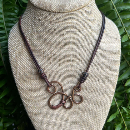 copper swirl necklace on bust