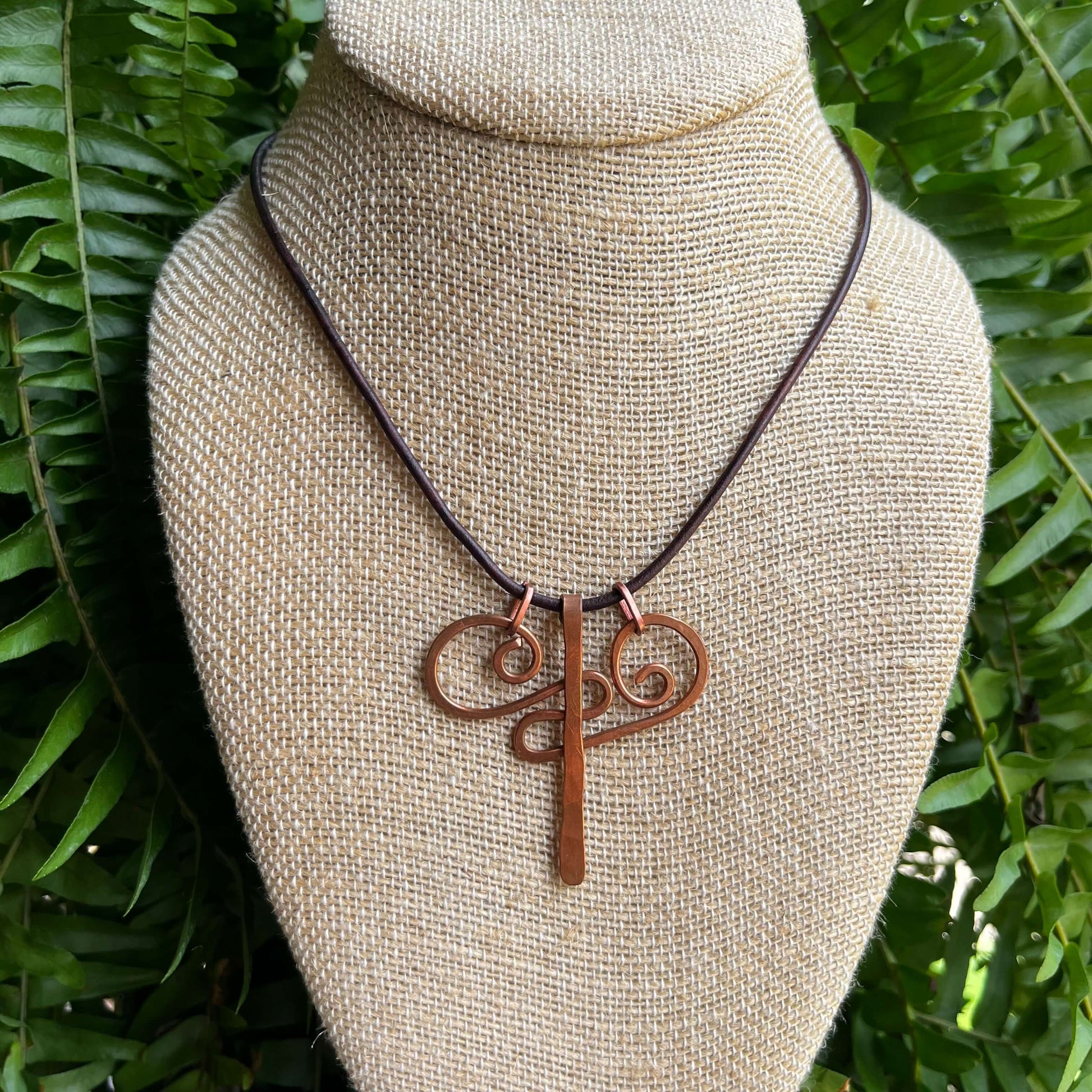 swirl necklace with moving part on bust