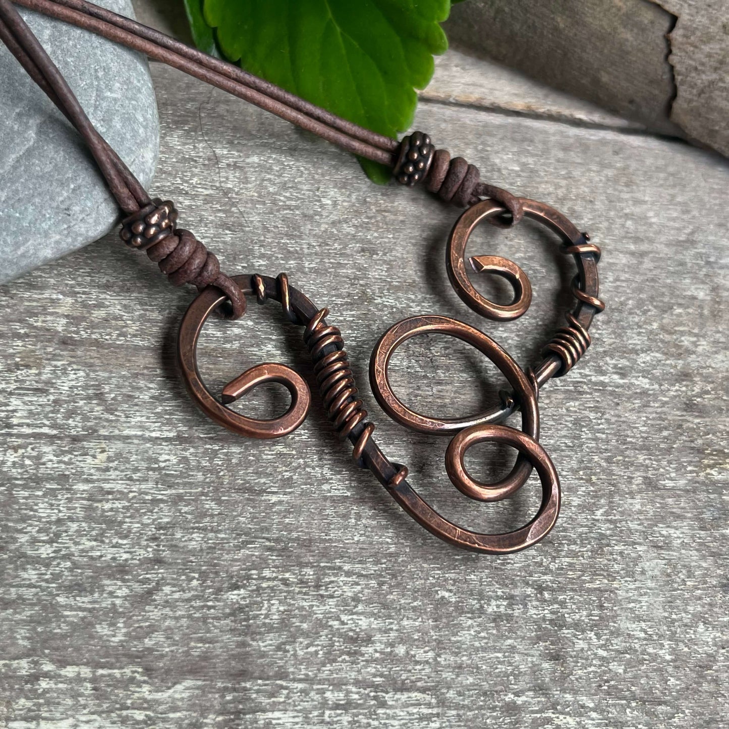 close up of copper swirl necklace