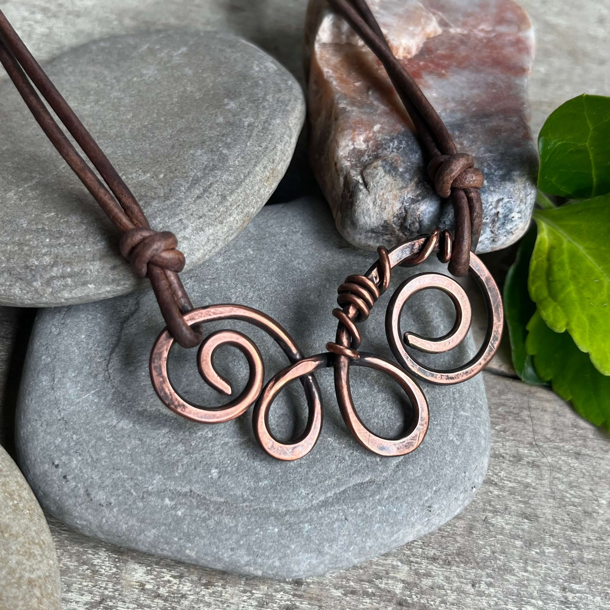 close up of copper Swirl necklace