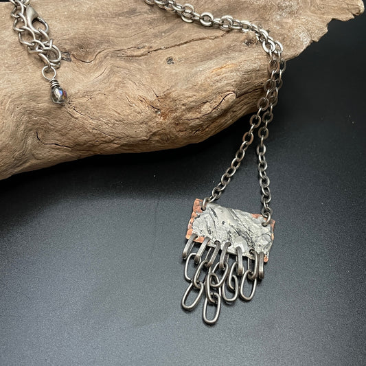 Mixed metal necklace with hanging chain