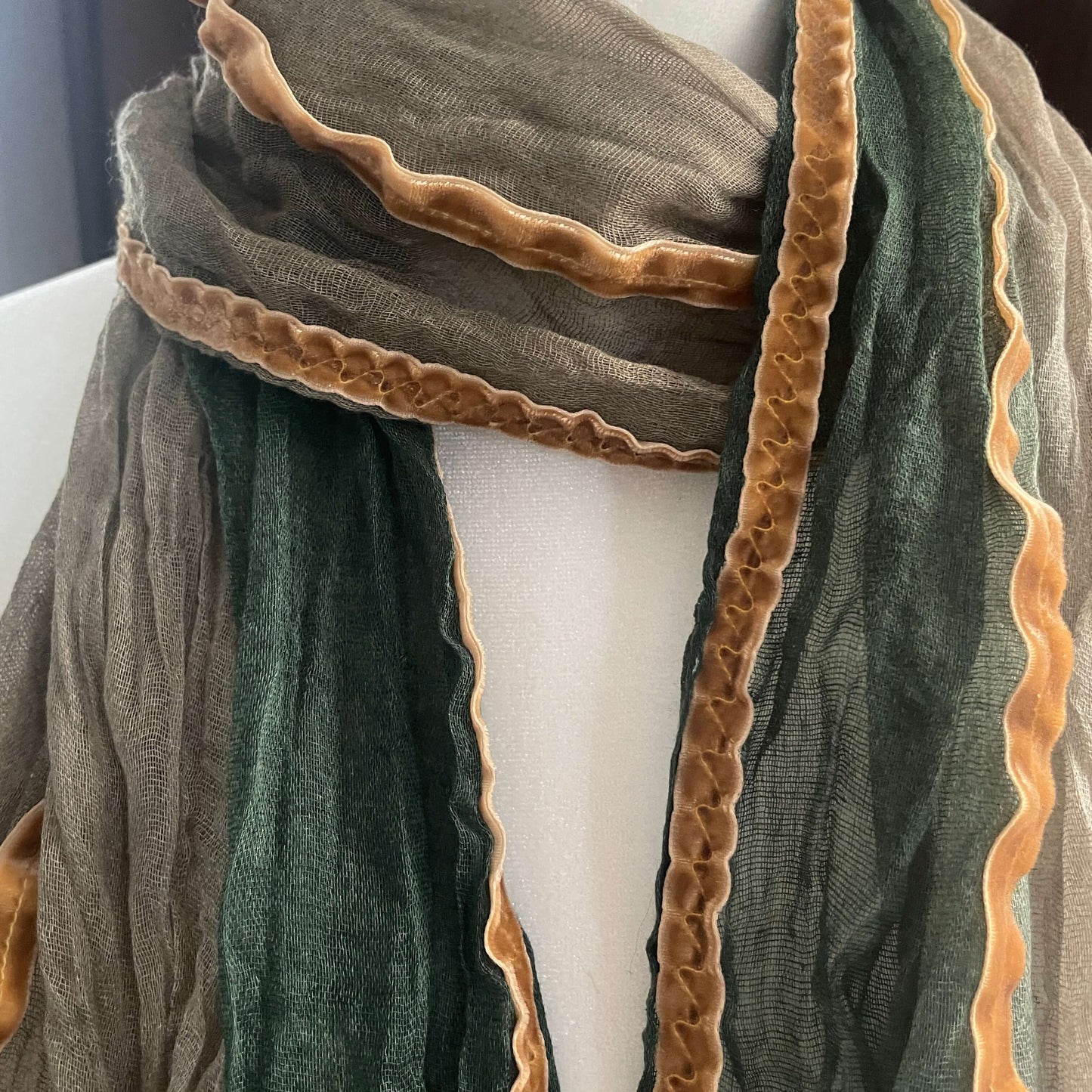 close up of green and tan scarf