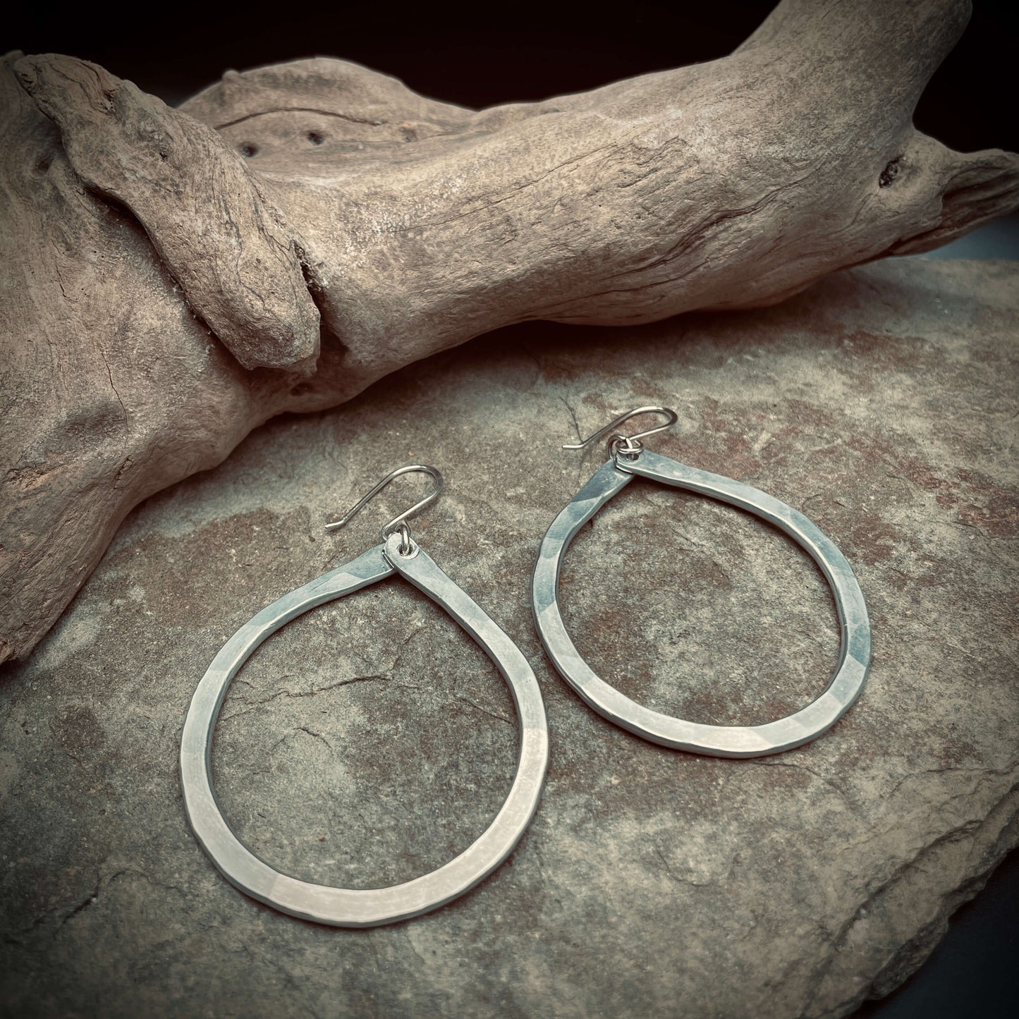 close up of aluminum earrings