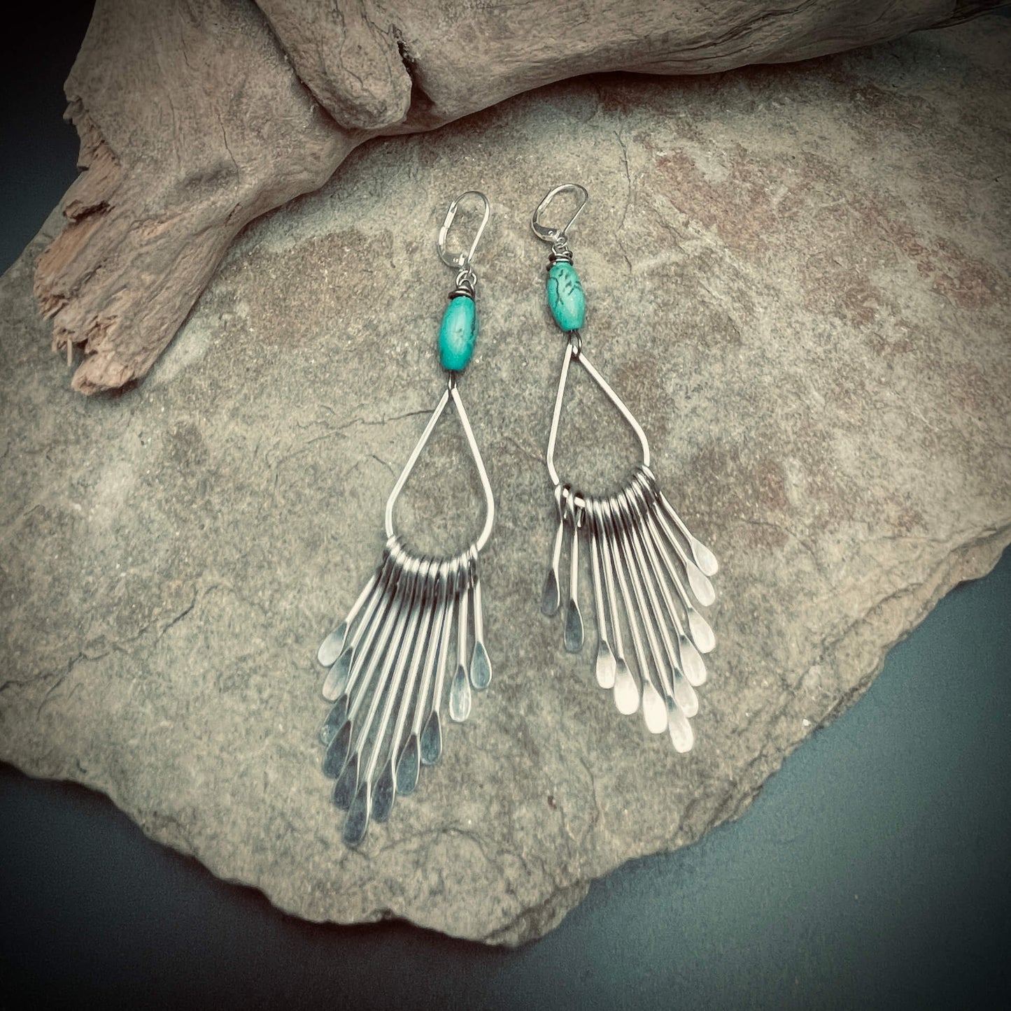 Fringe Earrings on rock