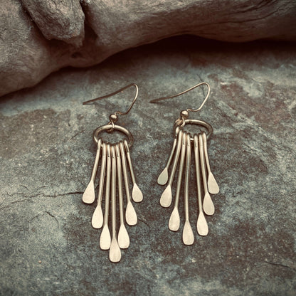 close up of circle Fringe earrings