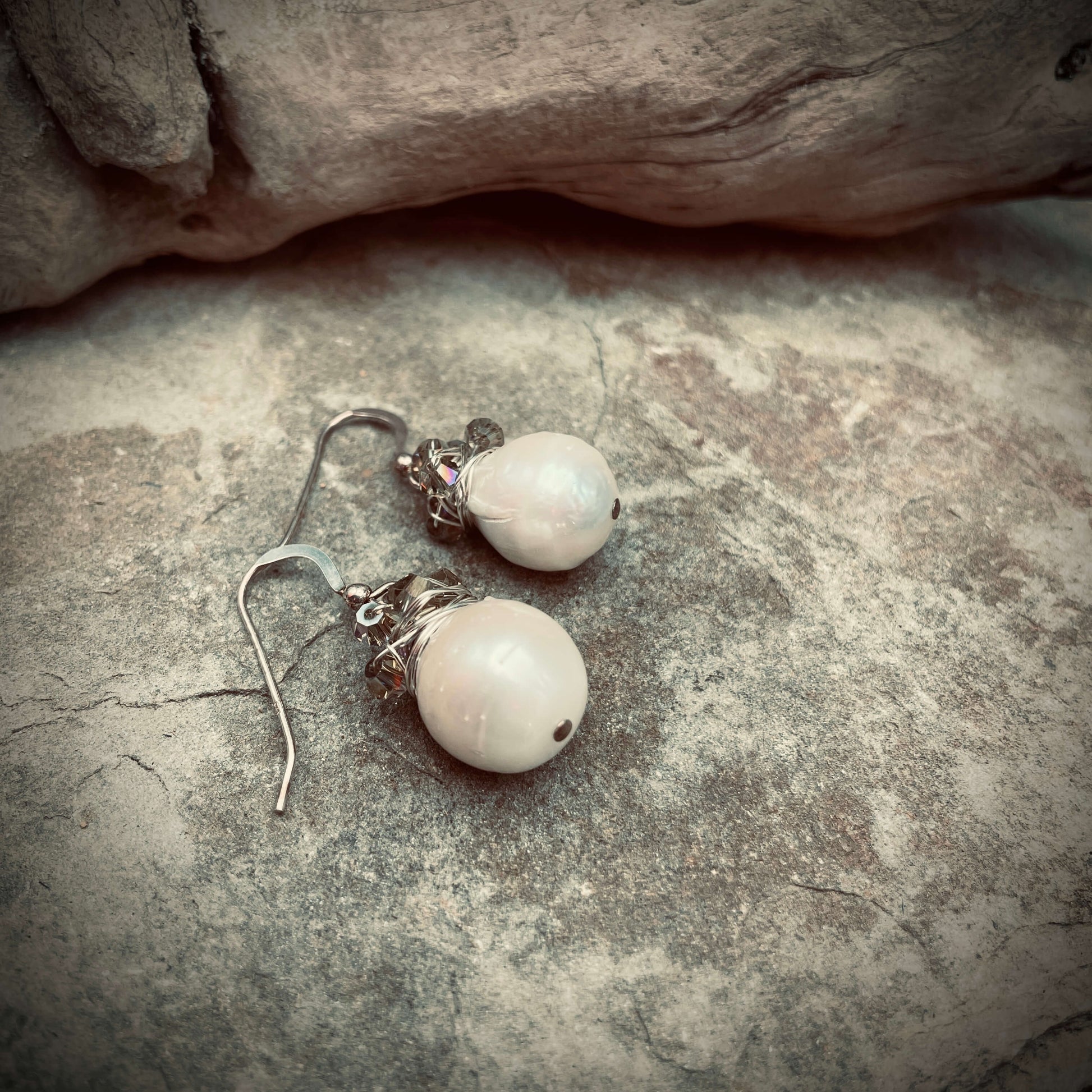 Pearl Earrings on rock