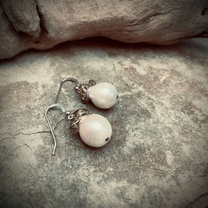 Pearl Earrings on rock