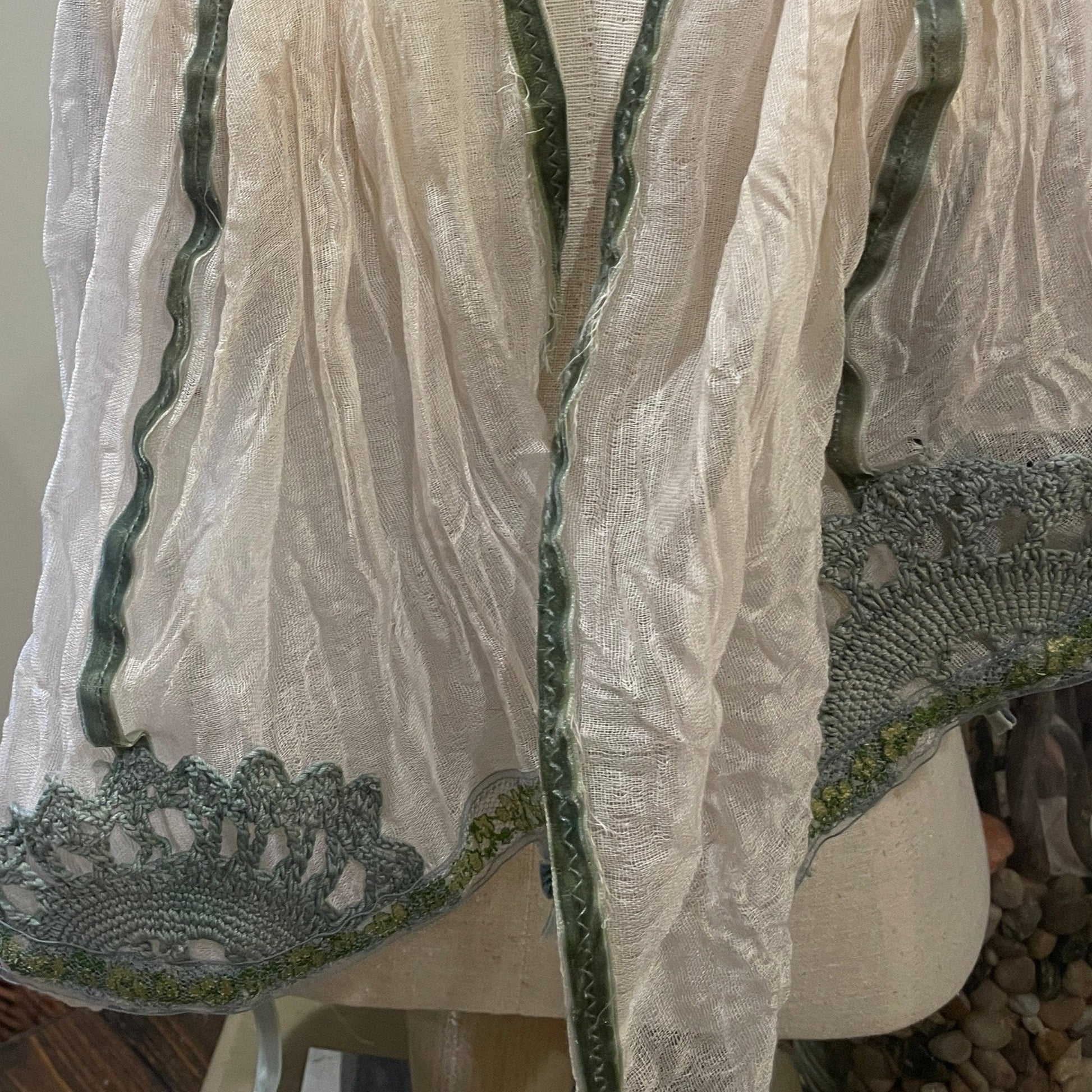 white and green scarf on bodice